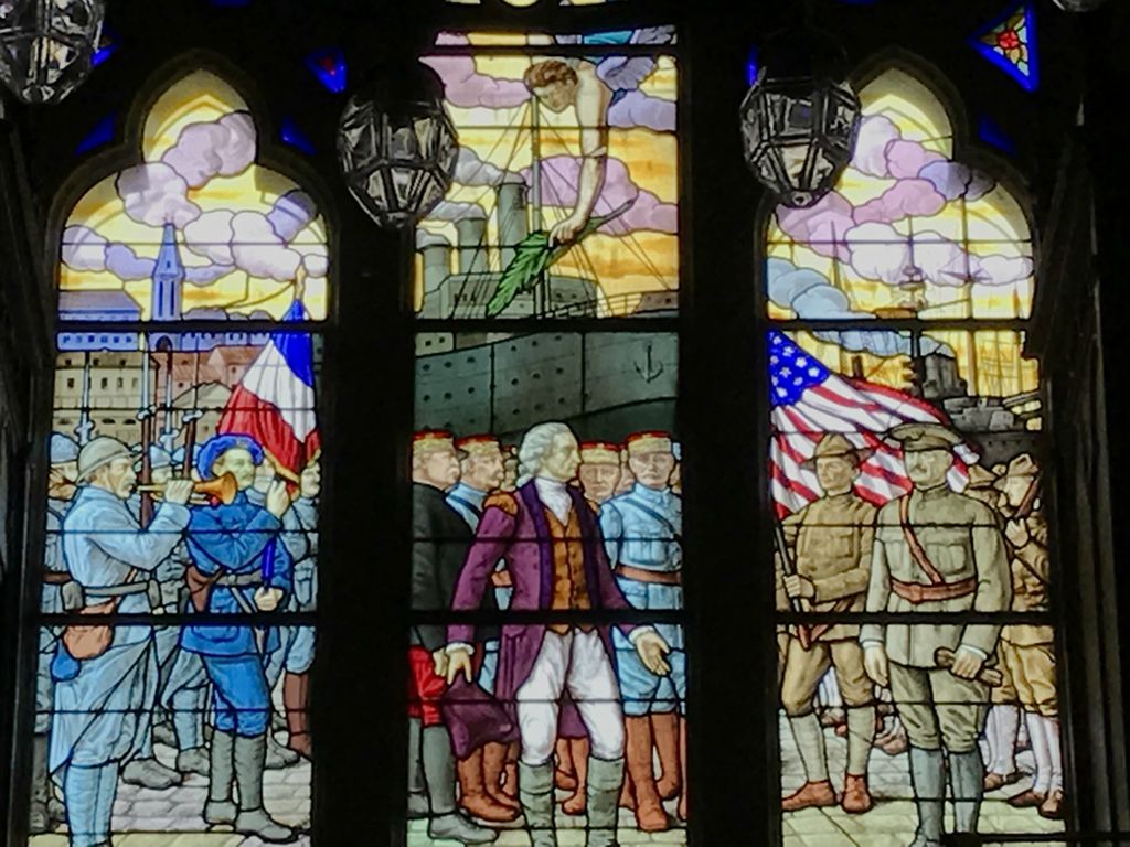 Stained glass window in the American Memorial Church depicts a meeting between Lafayette and Pershing